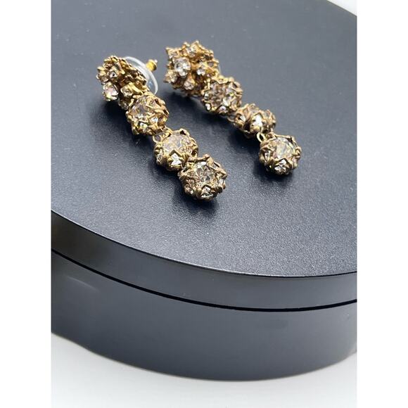 Vintage Gold-Tone Filigree Drop Rhinestone Accents
Statement Dangle Earrings - Picture 14 of 15